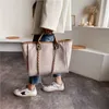 % 50 indirim fabrikası çevrimiçi basit tuval çanta kadın moda küçük koku zinciri yeni el tipi bir omuz