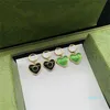 Trendy Interlocking Letter Love Studs Heart Designer Hoop Boucles d'oreilles pour les femmes Anniversaire Date Dangler