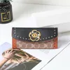 80% de réduction sur le dédouanement du sac à main New Golden Classic Fashion Live Leather Camellia Flower Long Wallet Large Capacity Women's Bag