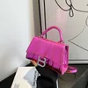 Luxury Handbag Shop 85% de réduction sur le sac à main de luxe sac de conception de niche pour les femmes 2023 été nouveau sablier rouge Internet avec motif de pierre portable une épaule bandoulière