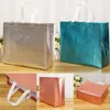 Sacos de compras Mulheres reutilizáveis ​​Bolsa de grande capacidade de tecido não entrelaçado a laser de armazenamento Glitter fêmea bolsa de compras feminina
