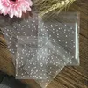 Opakowanie prezentów Aomily 100pcs/zestaw 3 rozmiary białe kropki plastikowe torbę świąteczną przezroczystą mrożoną imprezę ślubną opakowanie cukierków