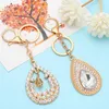 Keychains FLOLA Copper Gold Color Teardrop Keychain For Car Bag Holder Big Rhinestone Keyring Alloy Key Chain Jewelry Gifts Unisex Kcha033