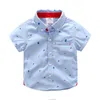 Set di abbigliamento Abbigliamento estivo per bambini Stile Inghilterra 2 3 4 5 6 8 10 anni Abbigliamento per bambini in cotone Tasca Camicia a maniche corte con stampa di cartoni animati per ragazzo 230508