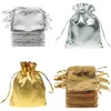 Opakowanie na prezent 100pcs złote srebrne torby z sznurkiem słodycze torebka biżuterii na świąteczne przyjęcie weselne
