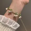 Bedelarmbanden elegante persoonlijkheid witte bloemen blad lichtmetalen glazuur lelie vallei kettingbangle voor vrouwen vrouwelijke sieraden