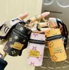 Модель Дизайнерский письменный буква для ключей кошелек Keyring Fashion Swork Подвесная автомобильная цепь шарм ковш Сумка Цветочная мини -держатель монеты для брелок для брелок для подарков аксессуары