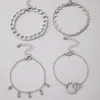 Cavigliere Stile punk Scavato Amore Combinazione Bracciale a quattro strati Nappa con goccia d'acqua Set multistrato