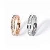 Ringas de banda Luxo aaa cz anel de zircônia para mulher homem 18 kgp Rose Gold Silver Color 316L Aço inoxidável Jóias de casamento Frete grátis (GR208) Z0509