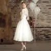 Nya tre kvart ärmar spetsar Vintage V-Neck billig strand brudklänningar casamento vestidos de kort bröllopsklänning