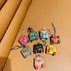 Keychains Lanyards Handmade Mini Tiny PU Leather Handbag Decoration Pendant Bag Earphone Case Trendy Key Charm Miniature Purse Support consignment 230508