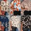 Vendita al dettaglio delle donne del progettista magliette 2023 moda casual stampato Split manica a pipistrello supera le signore camicette larghe Plus Size 3XL