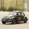 Modèle moulé sous pression 1 36 véhicule 13 cm dessin animé rétro Batmans Beetle modèle de voiture en alliage ouverture de porte tirer vers l'arrière jouet ornements de voiture enfants cadeau garçons 230509