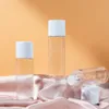 100ml 120ml 150ml 200ml Bouteilles de toner en plastique vides Essense Travel Bottle Dispenser Container with White Cap for Makeup Remover Serum