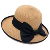 2023 New Sunshade Straw Hat Sun 모자 야외 패션 우아한 여성 모델 Bow Hat Spring and Summer Models