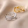 Ringas de banda Anéis cruzados de zircão para mulheres anel de aço inoxidável de ouro 2023 Jóias estéticas de casamento de tendência Item de frete grátis Anilos Z0509