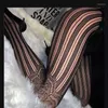 Women Socks Fashion Hollow Out Women's Sexy Fishnet Stockings Black Lace Jacquard Slim Lolita Tie Pantyhose Thin Nylon Tights