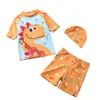 Kinderbadebekleidung 2023 Baby Boy Bademode mit Cap Suit Surf Wear Dinosaurier Shark Schwimmanzug Kleinkind Kleinkind Kinder Sonnencreme Strand Badeanzug P230509