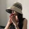 Стингевые шляпы элегантного летнего солнца для женской девочки регулируют широкие ультрафиолетовые защиты пляжные шляпы дышащие складные панамские шапки хвостика 230508