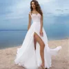 Sexig plusstorlek land bröllopsklänningar en linje mössa ärmar brudklänningar vita spetsar rygglös strand bröllopsklänning skräddarsydd