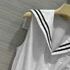 Robes d'été Tempérament Fille Revers Maillot Conception Soie Coton Robe Blanche Collision Couleur Sangle Processus Taille A-ligne Robes De Créateurs Pour Femmes