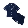 Pajamas Niños Niños Niños Lino de algodón 2 piezas de manga corta Botón Coloque Botón Camisetas
