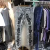 Jeans pour hommes tissu lourd brodé sans fin hommes femmes qualité joggers pantalon trou vieux jean cargo pantalon 230509
