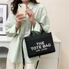 2024 lazer pequena rede simples das mulheres vermelho ombro crossbody palha tecido bolsa 70% de desconto na loja atacado