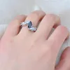 Anéis de casamento exclusivos Marquise Cut Black Stone Wave para mulheres cor de prata Bravos de zircão branca Mã