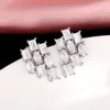 Stud -oorbellen Huitan Geometrisch gevormd voor vrouwen ingelegde ovaal/vierkante/peren kubieke zirkonia mode gecontracteerde dame's oorrang sieraden