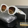 S Lunettes de soleil de créateurs pour femmes Lunettes de soleil Classic Round Crame Sunglasses Men Unisexe Designer Goggle Beach Sun Glasses Channel UV400 avec boîte 874 11
