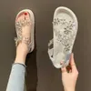 Sandals sandalen Fairy Style zomer 2023 Nieuwe elastische band Rhinestone Flower Student Flat Beach Roman Fashion Casual Breathable Shoes AA230509