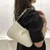 Bolso de diseñador para mujer Bolsos de maquillaje de moda Bolso clásico francés para las axilas Bolsos de aplausos callejeros para fiestas Selección de colores múltiples Venta al por mayor al por menor