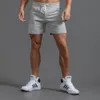 Herr shorts vit spår träning elastisk midja knä längd svett joggar sommar träning fitness gym med fickan 230510