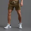 Herr shorts vit spår träning elastisk midja knä längd svett joggar sommar träning fitness gym med fickan 230510