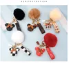 Designer keychain bear mouse head leather fur ball pendant key chain bow car pendant metal fashion personality creative cute