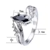 Anéis de casamento exclusivos Marquise Cut Black Stone Wave para mulheres cor de prata Bravos de zircão branca Mã