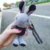 Keychains Korea schattige cowboy sleutelhanger streep auto sleutel hangpop machine tas cadeaus voor vrouwen