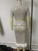 İki parçalı elbise kadın seksi payetler kalça etek 2 adet set parlak kırpılmış üstler hem tüy gövde etek takım elbise 2023 moda parti parıltı kıyafetleri T230510