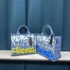 Ontwerper De Tote Handtas Tas Tas Bag Ladies Painted Graffiti Canvas Bag Tas Tote Handtas Tas Tas Shopping Men Multifunctionele decoratie Twill met logo -letters