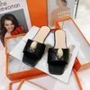 Slippers women's slippers 2023 Eagle Head Diamond Buckle Sandals Designer open toe Hardware outdoor flat heel female women slides black Y23