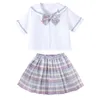 Roupas Conjuntos de roupas Girls Classic Roupas Conjunto de verão adolescente jk uniforme zíper Design de mangas curtas e saia 2pcs ternos da escola com gravata y23