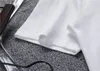 T-shirt da uomo firmata in bianco e nero 100% cotone traspirante antirughe bordo triangolare marchio lettera stampa moda casual uomo e donna stesso stile estivo