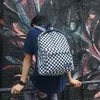 Backpack 2023 Zwart -witte plaid Harajuku -stijl Koreaanse versie van de Label Retro Fashion Bag