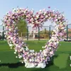 Arrangement de fleurs de rangée de fleurs en forme de coeur de 6.5FT avec arc en métal fond de mariage ensemble d'arc floral décor d'accessoires de scène de fête