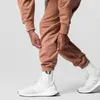 Pantalons pour hommes 2023 coton Sport hommes en cours d'exécution avec poches à fermeture éclair formation Joggings pantalons Fitness pantalons de survêtement décontractés bas