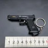 G34 Gun TTI Speed ​​Chasing Shell Ejection Pistol Alloy Miniature Toy Gun Keychain Survival Pistol Model Löstagbar kula som kastar 2082 Bästa kvalitet