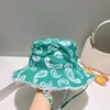 Luxury designer bucket hat new summer fisherman hat fashionable style comfortable breathable and beautiful with windbreak rope very good nice