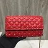 Handheld bag with rock studs, spike, top layer of cowhide material, new casual women's shoulder bag