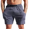 Execução de shorts Projeto de caminhada masculina para o treino atlético seco 7 "Treinamento de tênis de ginástica esportiva leve com bolsos